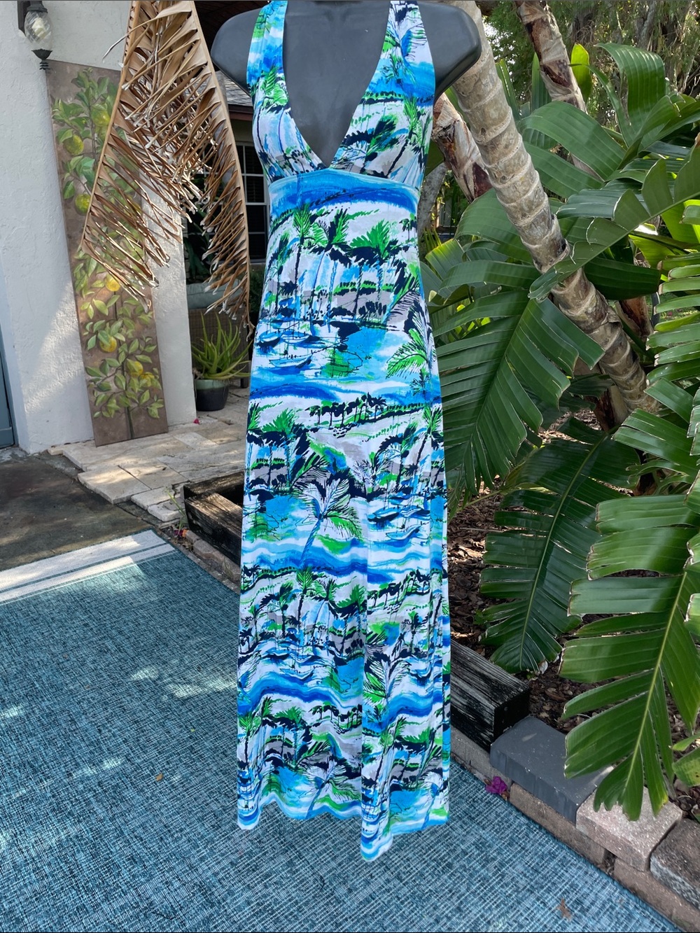 Tommy Bahama coastal maxi dress featuring a tropical boating landscape